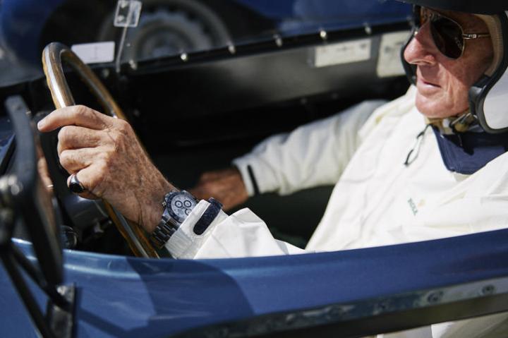 2017年古德伍德老式赛车会，劳力士代言人Jackie Stewart爵士于Ecurie Ecosse致敬巡游活动。 ©Rolex, Guillaume Mégevand