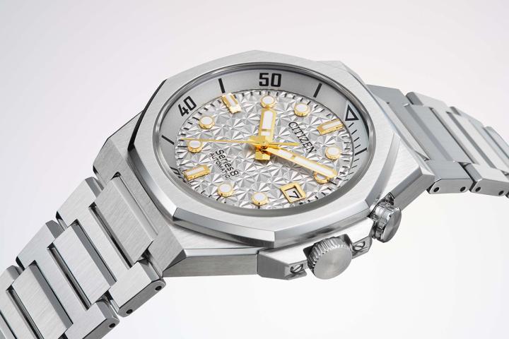 NB6060-58H 晨光银色几何表盘，光影流转，绽放现代都会活力。