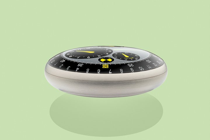 Ressence 的专利 ROCS 3 系统透过磁力驱动的旋转显示盘让时间 "不再依附指针"，而是以图像形式存在，使表面完全消除折射干扰，任何角度皆如纸面般纯净。