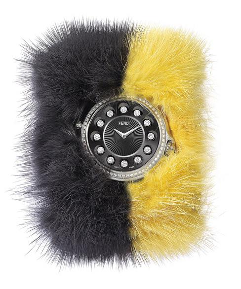 Crazy Carats 2014-15秋冬限量特别款，配戴者只要旋转表冠就可以随时更换不同的珠宝时标搭配着大胆的色调——暗灰色与鲜黄色