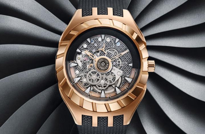 表款面盘采用透视设计，露出机芯零件，同时面盘也能看到透明的环形自动盘，展现机械结构的奥妙