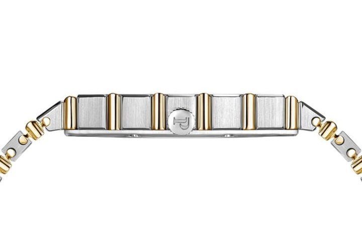 表壳厚度仅 7.45mm，主体为拉丝 18K 白金，嵌入抛光黄金浮凸条纹呈现双色美学。