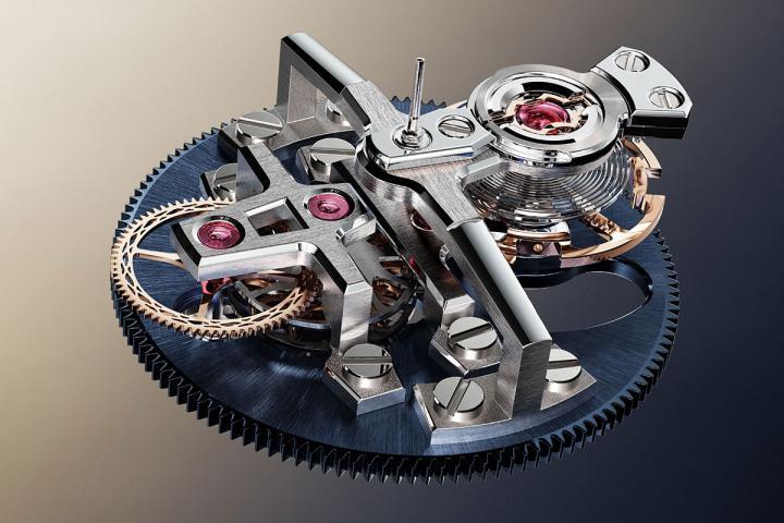 新型擒纵装置能将传递到摆轮的推动力与擒纵轮的转动 (以及齿轮系的其余部分) 分离。与瑞士杠杆式机构不同，陀飞轮框架的惯性几乎不再产生影响。透过分离这两项功能，宝玑得以在此尺寸下打造搭载 10 赫兹振动器的陀飞轮，并在设计上更自由，例如将摆轮置于框架旋转中心之外。由于振频极高，整个陀飞轮的转动非常平顺，肉眼几乎不可察觉其步进。