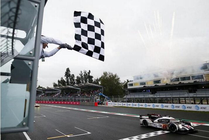 Timo Bernhard crossing the finish line